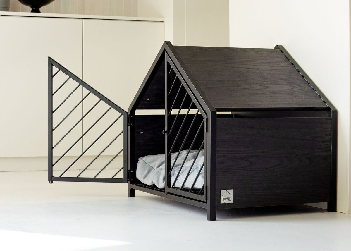 Modern black pet bed with geometric design in a minimalistic room.