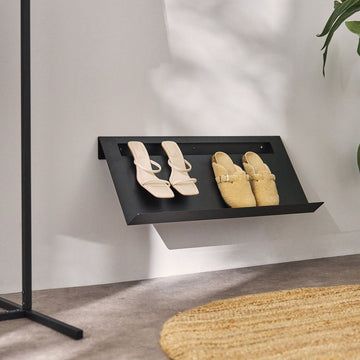 Modern Wall-Mounted Magazine Rack, Black Metal, Space-Saving Design for Home and Office